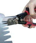 Person using Duct Notcher Tool for HVAC work 9 inch handy hand notcher with black and red finish for precise duct cutting