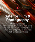 PEC-12 photographic emulsion cleaner kit and PEC-PAD lint-free wipes banner with film negatives in background.
