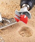 Close-up of 35mm concealed hinge jig drill bit over wood, ideal for precise cabinet door woodworking.