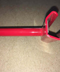 Close-up of PPC Cleat Tool 24 Inch With Magnetic Jaws For HVAC Duct Installations, showing red magnetic jaws and handle.