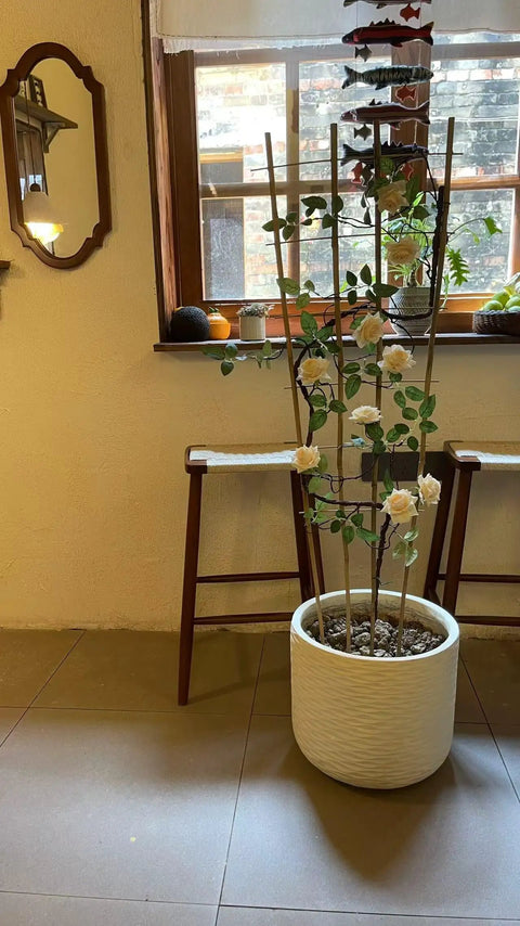 3 Pack 4 Foot Bamboo Trellis Fan Shaped Plant Support in indoor setting with climbing plant in white pot near window