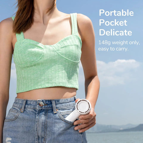 Bladeless Mini Portable Fan With Safe Design Turbo Handheld Breeze 5 Speed Modes USB Rechargeable Up To 16 Hours Cool Time shown in pocket