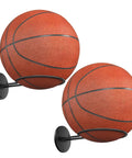 Two Pack Wall Mount Basketball Racks Black Space Saving Ball Holder For Home Gym Or Bedroom Decor Keeps Basketballs Footballs Rugby Balls And Volleyballs Organized Like A Pro In Small Spaces shown with basketballs.