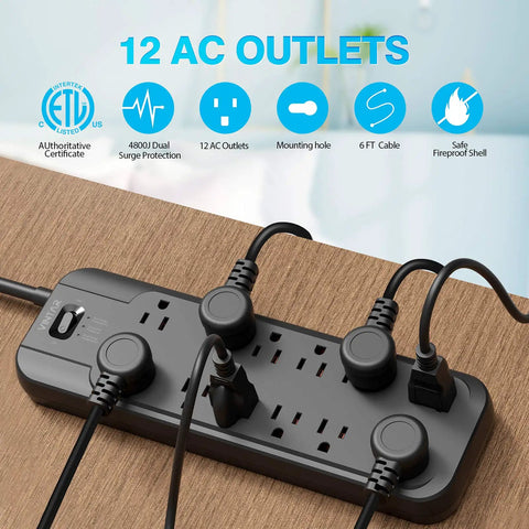 Dual 4800 Joule Surge Protector Power Strip With 12 Outlets, 6ft Flat Plug Cord, 1875W Output, Black on wooden surface