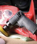 Compact Mini Orbital Sander For Metal Prep And Rust Removal Feather Edging Smoothing Welds And Quick Finishes tool shown sanding red part