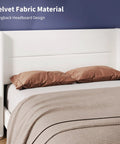 Game-Changing Queen Bed Frame With Dope White Velvet Wingback Headboard And Upholstered Platform Design Featuring Hardcore Metal Support And Thick Wood Slats For Solid Stability And Low-Key Luxury Vibes In Your Room - Close-up of white velvet wingback headboard and pillows.