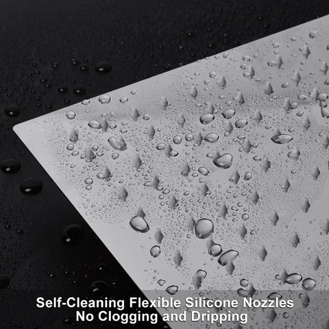 Close-up of stainless steel square showerhead showing self-cleaning nozzles on the 12 Inch High Pressure Square Rain Showerhead With 11 Inch Adjustable Arm Delivers Full Body Coverage In Stainless Steel That Is Corrosion Resistant And Durable For A Luxury Spa Style Bathroom Upgrade Built To Last.