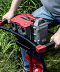 Man operating 60V Cordless Dirt Auger With 8 Inch High Performance Bit in garden