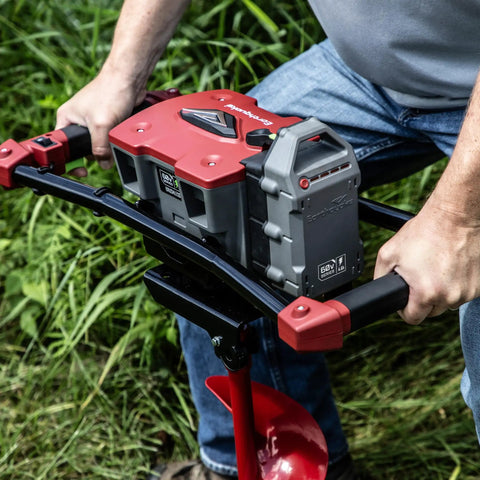 Man operating 60V Cordless Dirt Auger With 8 Inch High Performance Bit in garden