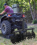 ATV with Beefy 34 Inch Disc Plow Harrow Heavy Duty With Adjustable Height And Wide Cut For ATV UTV Attachments in field