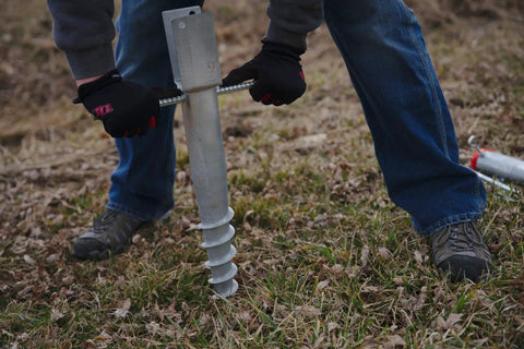 U Model Ground Screw Anchor For 4x4 Posts being installed in ground, showing durable no dig post stake application