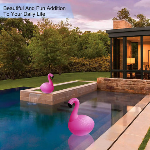 Solar Flamingo Floating Pool Lights 4 Pack, Solar Powered LED Flamingo Lights in modern backyard pool at sunset glowing pink