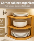 Total Kitchen Game Changer, Super Handy Bamboo Corner Shelf, 3 Tier Plate Rack in cabinet with white plates.