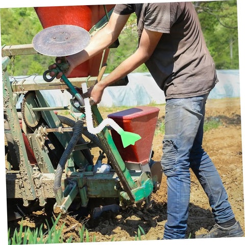 Farmer using Multipurpose Seed Drill Tube Kit For Precision Planting Wheat Corn Grain And Tree Seedlings with seeder