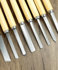 Eight Piece Wood Turning Chisel Set With Lathe Tools, Pro Grade Triple Tempered Chromium Vanadium Steel on wood surface