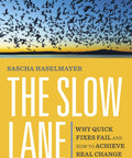 Cover of The Slow Lane Guide By Sascha Haselmayer featuring flying birds at sunset, promoting personal growth.