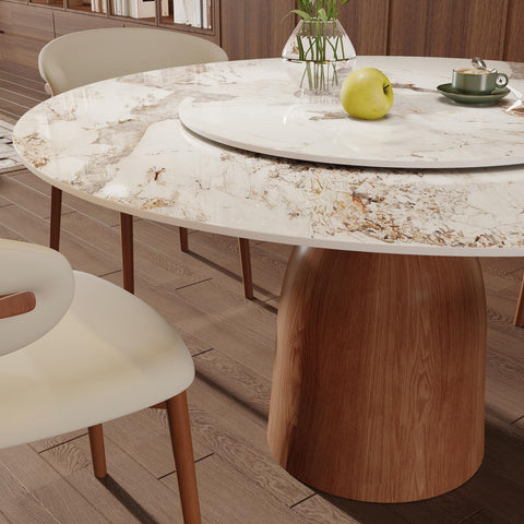 53 Inch Round Dining Table With Smooth Rotating Lazy Susan And Solid Hourglass Base Delivers A Clean Marble Look Top Crafted For Relaxed Weekend Hangouts Seats 6 To 8 In Brown featuring faux marble top and wooden hourglass base.