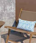 Outdoor Lumbar Pillow Covers 12x20 Inches Pack Of 2 Covers Only Fade Resistant Polyester Cushion Cases For Patio Balcony Garden All Weather Use Pebble Blue on chair