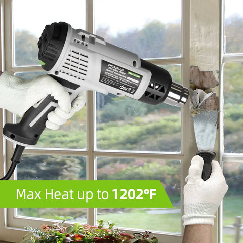 Using hot air gun with adjustable temperature for paint removal, showing heat output on window frame with gloves, max 1202°F.