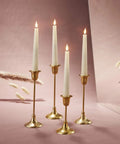 Flameless Taper Candles Set With Realistic 3D Wick Flame, 7 Inch Ivory Wax, 4 Pack, elegant decor display with gold holders.