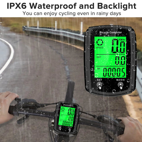 Bike Computer Odometer With Wired Speed Sensor MPH And KMH Readouts Auto Wake Up LCD shown in rain, mounted on handlebars