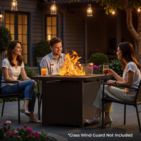 Friends gathered around Propane Gas Fire Pit Table 32 Inch Square Outdoor Patio Brown With 50,000 BTU Stainless Steel Burner And Glass Stones