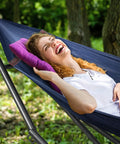 Person relaxing in a Two Person Hammock With Stand Foldable Outdoor Hammock Set 600 Lb Capacity Portable Carrying Case Aegean Color