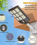 Beast Bright 3200W Solar Street Light With Dusk To Dawn And Motion Sensor mounted on a pole, showing LED panels and battery details.