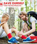 First aid kit - 97 piece small travel kit; red pouch with white cross as a hiker treats a boy's knee outdoors.