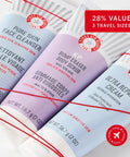 Travel Friendly Skin Care Gift Set Featuring A Gentle Facial Cleanser KP Body Scrub For Silky Skin And Ultra Repair Cream For Deep Hydration And Nourished Skin, showcasing three travel-size tubes with red ribbons.