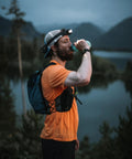 Person wearing Hardworking Tactical LED Headlamp With Five LEDs 650 Lumen Spot And Flood Beam Plus Hardhat Mount outdoors