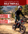 Child riding a kids electric dirt bike 36V 350W motor with alloy wheels and fourteen inch pneumatic tires on a trail.