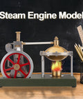 Hands On Steam Engine Kit For Makers Retro Vertical Metal Engine With Spherical Boiler displayed on a tabletop with a flame