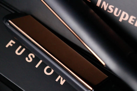 Close-up of Fusion 480 Hair Straightener with high heat power and pro grade tourmaline ceramic plates for salon quality smooth styles.