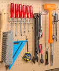 Pegboard Hook Set 50 Piece Heavy Duty Assortment For One Quarter Inch Pegboards Includes Hooks And Holders For Garage Workshop And Craft Room Organization Wall Mount Storage For Tools And Supplies showing tools neatly organized.