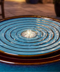 Top view of a 9 Inch Outdoor Ceramic Water Fountain With LED Light Round Bubbler Water Feature Eastern Style Waterfall