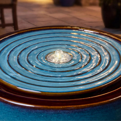 Top view of a 9 Inch Outdoor Ceramic Water Fountain With LED Light Round Bubbler Water Feature Eastern Style Waterfall
