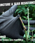 Heavy Duty Black Nitrile Disposable Gloves Bring Tough As Nails Defense With A Rock Solid Grip Pattern And 6.3 Mil Thick Shield To Dodge Razor Blades Or Slippery Grease Sold In Pack Of One Hundred Medium Sized Tools For Badass Industrial Use, shown gripping a thorny branch.