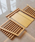 Unassembled Montessori Geography Map Stand For Puzzle Maps Large Beechwood on tile floor, showing slats and panels.