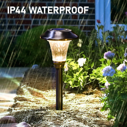 Solar Pathway Lights Outdoor Waterproof With Glass Stainless Steel Build illuminating garden under rain, ideal for walkways