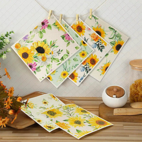 Six Pack Swedish Kitchen Dish Cloths Reusable Paper Towels, sunflower design, hung on line and laid on wooden counter