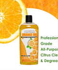 Orange Oil Concentrate All Purpose Cleaner Degreaser With Pet Odor Eliminator 12 Ounce bottle next to orange slice.