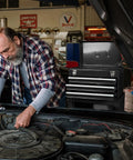 Rolling Garage Tool Organizer With Detachable 3 Drawer Chest And Large Cabinet beside a mechanic working on car engine