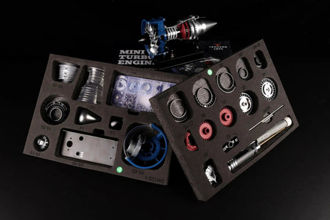 Ultra Realistic Mini Metal Turbofan Engine Model Kit That Actually Runs 1:20 Scale parts in foam tray with assembled model