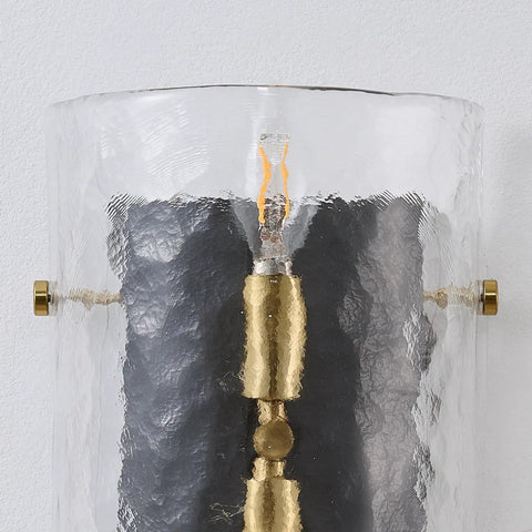 Close-up of MWZ Modern 2-Light Wall Sconce Set of 2 with Water Rippled Glass Shades 11" showing curved glass and light bulb.
