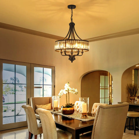 Modern Black Crystal Chandelier With 5 Lights, Farmhouse Style Dining Room Fixture above a dining table with flowers and candles.