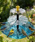 Colorful birds gathered around a Solar Powered Hanging Bird Bath Fountain With Cascading Water Feature For Gardens And Patios.