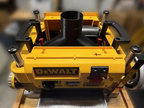Overhead Dust Port Upgrade for 4 Inch Hose Fits DW735 and DW735X Planers shown installed on top of a yellow planer