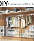 DIY modular closet setup with stacked shoe organizers and hanging clothes in a wooden wardrobe.