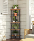 Built Different Five Tier Corner Shelf Stand with potted plants, rustic brown shelves, and black steel frame in a living space.